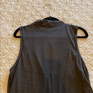 Slight mid neck thin Tank with a semi open back